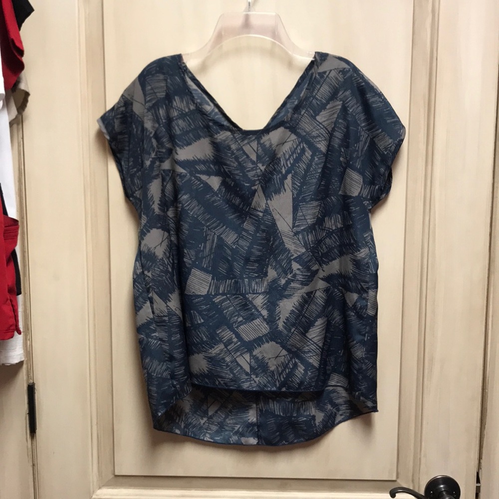 Pattern silk blouse. Criss cross back